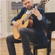 Profesor de guitarra, músico intérprete en guitarra clásica y guitarrista eléctrico